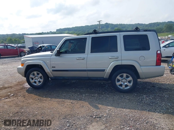 2007 Jeep Commander Sport z VIN 1J8HG48K87C696538, wystawiony jako IAAI lot #39853716 z przebiegiem 226 491 mil mil oraz . Historia ofert i sprzedaży dostępna na DreamBid. Obrazek 14.