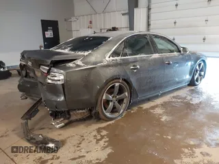 2015 Audi S8 with VIN WAUK2AFD0FN005369, listed as a IAAI auction lot 41312743 with 76,750 mi miles. Bid and sale history available at carsss.com. Image 4.
