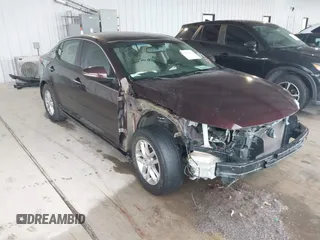2013 Kia Optima LX with VIN 5XXGM4A76DG252622, listed as a IAAI auction lot 41890887 with 128,002 mi miles. Bid and sale history available at carsss.com. Image 1.
