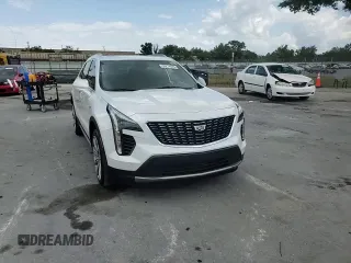 2020 Cadillac XT4 FWD Premium Luxury z VIN 1GYFZCR4XLF005029, wystawiony jako Copart lot #55274025 z przebiegiem 50 550 mil mil oraz Szkoda całkowita • Salvage title. Historia ofert i sprzedaży dostępna na DreamBid. Obrazek 14.