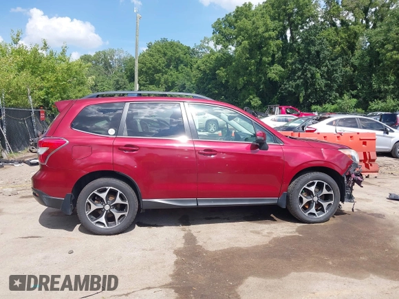 2014 Subaru Forester XT Touring with VIN JF2SJGMC9EH552996, listed as a IAAI auction lot 42540898 with 145,932 mi miles and . Bid and sale history available at DreamBid. Image 14.