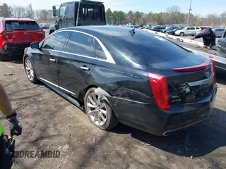 2014 Cadillac XTS Luxury with VIN 2G61M5S3XE9202454, listed as a IAAI auction lot 42025883 with 93,977 mi miles and . Bid and sale history available at DreamBid. Image 6.