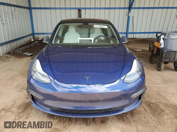 2018 Tesla Model 3 Long Range Battery z VIN 5YJ3E1EB3JF134664, wystawiony jako Copart lot #57288485 z przebiegiem Nie podano mil oraz Szkoda całkowita • Salvage title. Historia ofert i sprzedaży dostępna na DreamBid. Obrazek 5.