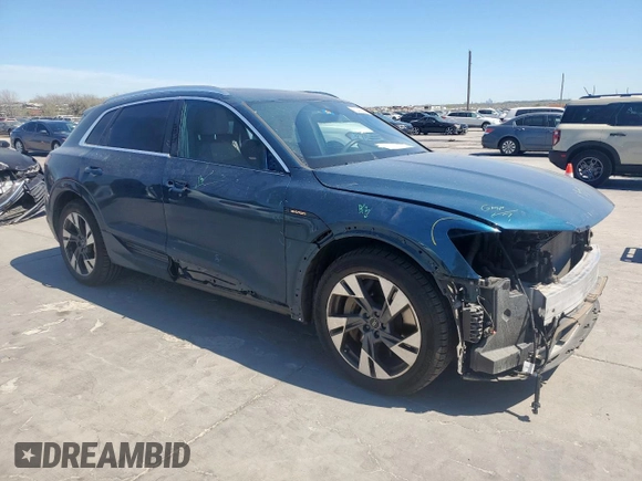 2021 Audi e-tron Premium Plus with VIN WA1LAAGE5MB030598, listed as a Copart auction lot 50411695 with 31,819 mi miles and Salvage title. Bid and sale history available at DreamBid. Image 4.