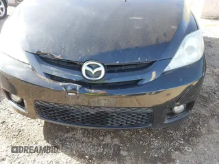2006 Mazda 5 Sport with VIN JM1CR293560119215, listed as a IAAI auction lot 41774497 with 203,660 mi miles. Bid and sale history available at carsss.com. Image 6.