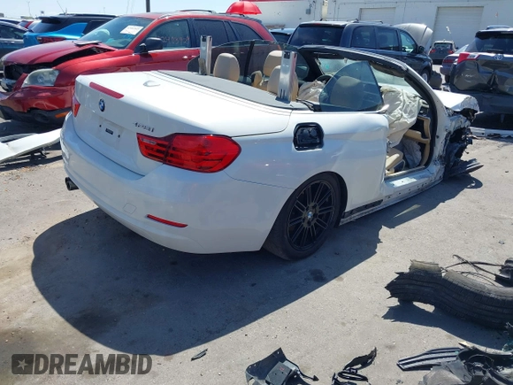 2014 BMW 4 Series 428i z VIN WBA3V5C5XEJ969029, wystawiony jako IAAI lot #42421779 z przebiegiem Nie podano mil oraz . Historia ofert i sprzedaży dostępna na DreamBid. Obrazek 4.