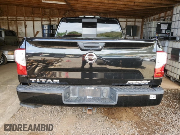 2018 Nissan Titan Pro-4X z VIN 1N6AA1E51JN531463, wystawiony jako Copart lot #52995885 z przebiegiem 62 873 mil mil oraz Szkoda całkowita • Salvage title. Historia ofert i sprzedaży dostępna na DreamBid. Obrazek 6.