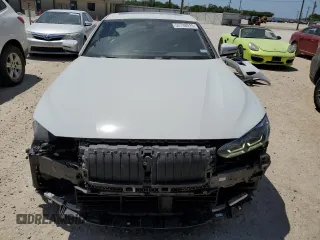 2024 BMW 4 Series 430i with VIN WBA63AV09RFR61736, listed as a Copart auction lot 52798015 with 45,705 mi miles and Salvage title. Bid and sale history available at DreamBid. Image 5.