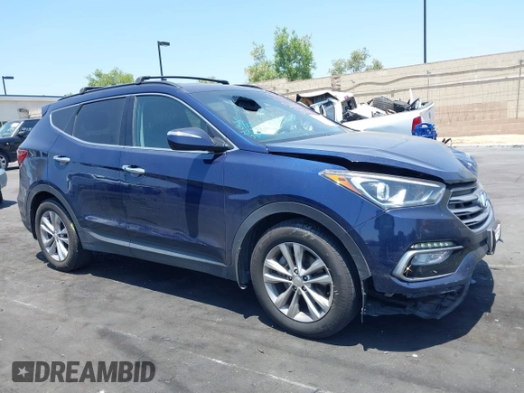 2018 Hyundai Santa Fe 2.0T z VIN 5XYZU4LA8JG537427, wystawiony jako IAAI lot #42349692 z przebiegiem 148 764 mil mil oraz . Historia ofert i sprzedaży dostępna na DreamBid. Obrazek 13.