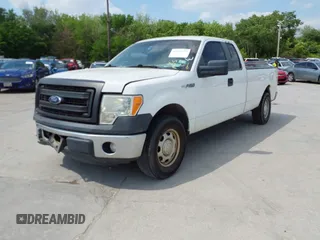 2013 Ford F-150 XL w/HD Payload Pkg with VIN 1FTVX1CF8DKD55791, listed as a IAAI auction lot 41987479 with 285,410 mi miles. Bid and sale history available at carsss.com. Image 2.