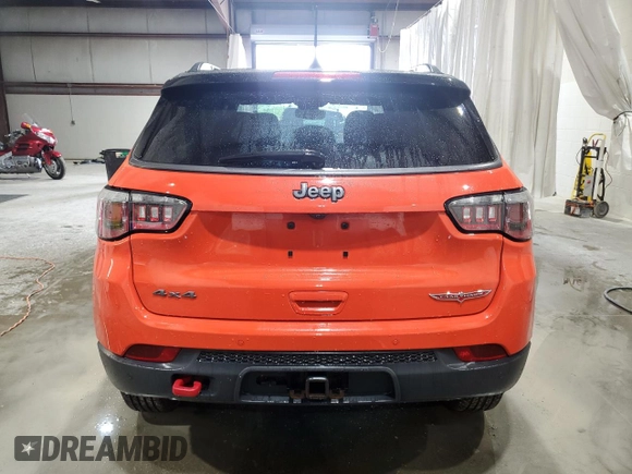 2017 Jeep Compass Trailhawk z VIN 3C4NJDDB4HT640927, wystawiony jako Copart lot #58468415 z przebiegiem 112 583 mil mil oraz Szkoda całkowita • Salvage title. Historia ofert i sprzedaży dostępna na DreamBid. Obrazek 6.