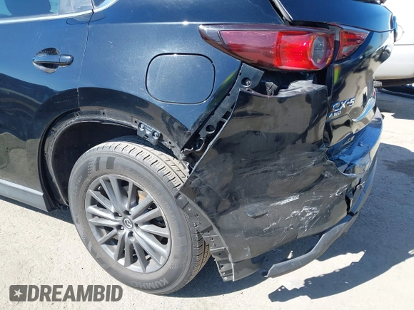 2019 Mazda CX-5 Sport with VIN JM3KFABM7K1579747, listed as a IAAI auction lot 41965097 with 151,042 mi miles and . Bid and sale history available at DreamBid. Image 12.