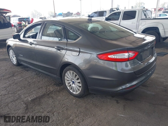 2015 Ford Fusion SE Hybrid with VIN 3FA6P0LU6FR309099, listed as a IAAI auction lot 42497429 with 157,631 mi miles and . Bid and sale history available at DreamBid. Image 3.