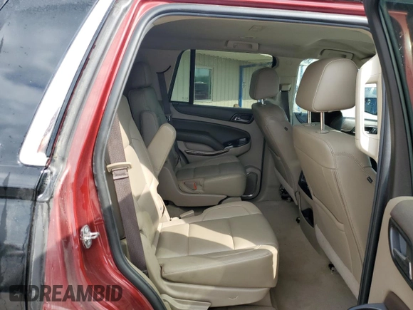 2019 Chevrolet Tahoe LT z VIN 1GNSCBKC2KR258478, wystawiony jako Copart lot #61722975 z przebiegiem 95 898 mil mil oraz Szkoda całkowita • Salvage title. Historia ofert i sprzedaży dostępna na DreamBid. Obrazek 11.