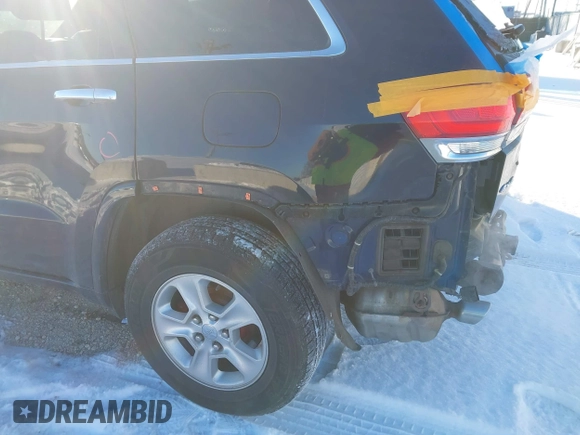 2014 Jeep Grand Cherokee Overland with VIN 1C4RJFCG1EC200570, listed as a IAAI auction lot 41301398 with 183,986 mi miles. Bid and sale history available at carsss.com. Image 22.