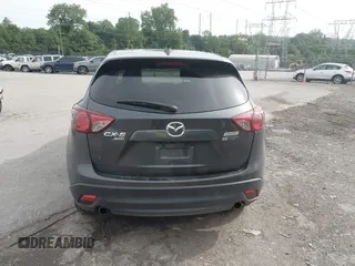 2014 Mazda CX-5 Touring z VIN JM3KE4CY2E0348500, wystawiony jako IAAI lot #42318155 z przebiegiem 182 616 mil mil oraz . Historia ofert i sprzedaży dostępna na DreamBid. Obrazek 16.