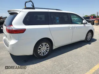 2015 Toyota Sienna XLE with VIN 5TDYK3DC1FS690219, listed as a Copart auction lot 60926525 with 97,879 mi miles and Salvage title. Bid and sale history available at DreamBid. Image 3.