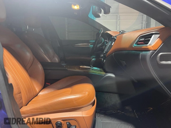 2014 Maserati Ghibli S Q4 z VIN ZAM57RTA0E1087454, wystawiony jako Copart lot #58608995 z przebiegiem 58 880 mil mil oraz Szkody całkowita. Historia ofert i sprzedaży dostępna na DreamBid. Obrazek 5.