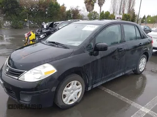 2011 Nissan Versa 1.8 S with VIN 3N1BC1AP7BL368816, listed as a IAAI auction lot 41794835 with 198,801 mi miles. Bid and sale history available at carsss.com. Image 6.