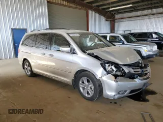 2008 Honda Odyssey Touring with VIN 5FNRL38998B052646, listed as a Copart auction lot 58357145 with 200,943 mi miles and Salvage title. Bid and sale history available at DreamBid. Image 4.