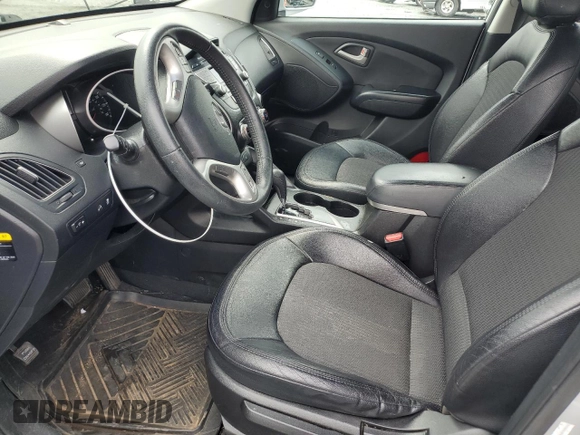 2013 Hyundai Tucson GLS with VIN KM8JU3AC1DU709937, listed as a Copart auction lot 52716295 with 181,711 mi miles and Salvage Title. Bid and sale history available at carsss.com. Image 7.