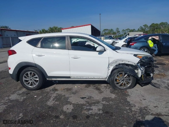 2018 Hyundai Tucson SE with VIN KM8J23A42JU627533, listed as a IAAI auction lot 41880112 with 61,840 mi miles. Bid and sale history available at carsss.com. Image 14.