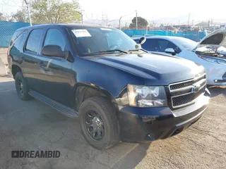 2012 Chevrolet Tahoe Commercial z VIN 1GNLC2E0XCR245940, wystawiony jako IAAI lot #41851106 z przebiegiem 85 441 mil mil oraz . Historia ofert i sprzedaży dostępna na DreamBid. Obrazek 1.