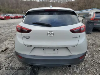 2019 Mazda CX-3 Touring with VIN JM1DKFC78K0405131, listed as a Copart auction lot 87065614 with 91,091 mi miles and Salvage Title. Bid and sale history available at carsss.com. Image 6.