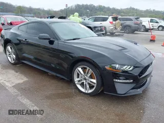 2021 Ford Mustang GT z VIN 1FA6P8CF2M5149643, wystawiony jako IAAI lot #41981794 z przebiegiem 57 345 mil mil oraz . Historia ofert i sprzedaży dostępna na DreamBid. Obrazek 1.