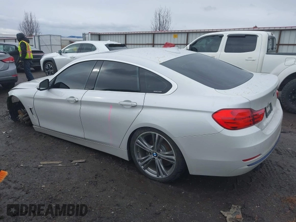 2016 BMW 4 Series 428i xDrive with VIN WBA4C9C54GG135615, listed as a IAAI auction lot 41655368 with 156,851 mi miles and . Bid and sale history available at carsss.com. Image 3.
