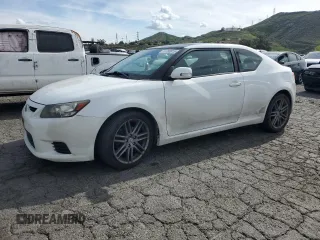 2011 Scion tC z VIN JTKJF5C75B3009196, wystawiony jako Copart lot #51088815 z przebiegiem 143 394 mil mil oraz Czysty tytuł • Clean title. Historia ofert i sprzedaży dostępna na DreamBid. Obrazek 1.