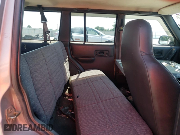 2000 Jeep Cherokee with VIN 1J4FN28S6YL210944, listed as a Copart auction lot 65163475 with 147,609 mi miles and Salvage title. Bid and sale history available at DreamBid. Image 11.