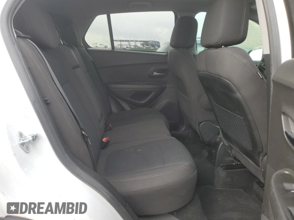 2021 Chevrolet Trax LS z VIN KL7CJKSB1MB312761, wystawiony jako Copart lot #51279365 z przebiegiem 63 098 mil mil oraz Szkoda całkowita • Salvage title. Historia ofert i sprzedaży dostępna na DreamBid. Obrazek 11.