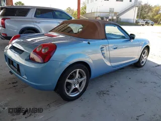 2003 Toyota MR2 z VIN JTDFR320130057360, wystawiony jako IAAI lot #41696384 z przebiegiem 52 621 mil mil oraz . Historia ofert i sprzedaży dostępna na DreamBid. Obrazek 4.