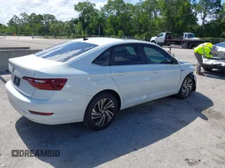 2021 Volkswagen Jetta SEL with VIN 3VWE57BU2MM047028, listed as a IAAI auction lot 42563875 with 56,695 mi miles and . Bid and sale history available at DreamBid. Image 4.