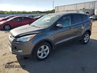 2014 Ford Escape SE z VIN 1FMCU9GX2EUA03079, wystawiony jako Copart lot #57667885 z przebiegiem 92 159 mil mil oraz Czysty tytuł • Clean title. Historia ofert i sprzedaży dostępna na DreamBid. Obrazek 1.