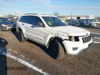 2014 Jeep Grand Cherokee Limited with VIN 1C4RJFBG7EC220677, listed as a IAAI auction lot 41177354 with 148,445 mi miles and . Bid and sale history available at DreamBid. Image 1.
