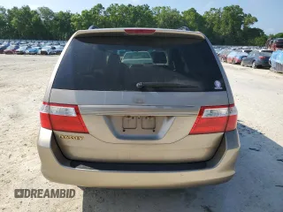2007 Honda Odyssey EX-L z VIN 5FNRL38607B418045, wystawiony jako Copart lot #51469885 z przebiegiem 180 108 mil mil oraz Szkoda całkowita • Salvage title. Historia ofert i sprzedaży dostępna na DreamBid. Obrazek 6.