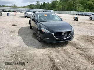 2018 Mazda 3 Touring z VIN 3MZBN1V3XJM268911, wystawiony jako Copart lot #51731825 z przebiegiem 151 921 mil mil oraz Szkoda całkowita • Salvage title. Historia ofert i sprzedaży dostępna na DreamBid. Obrazek 10.