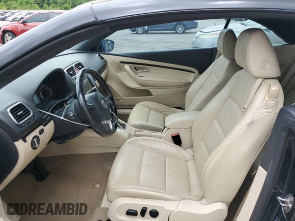 2013 Volkswagen Eos Executive с VIN WVWFW8AH0DV002612, выставлен на аукционе Copart как лот 58059915 с пробегом 117 671 миль миль и Списание • Salvage title. История ставок и продаж доступна на DreamBid. Изображение 7.