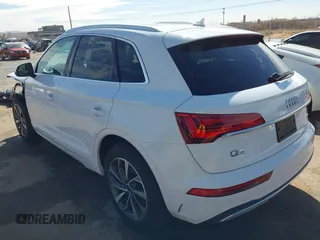 2021 Audi Q5 Premium Plus with VIN WA1BAAFYXM2125942, listed as a IAAI auction lot 41671026 with 63,804 mi miles. Bid and sale history available at carsss.com. Image 3.