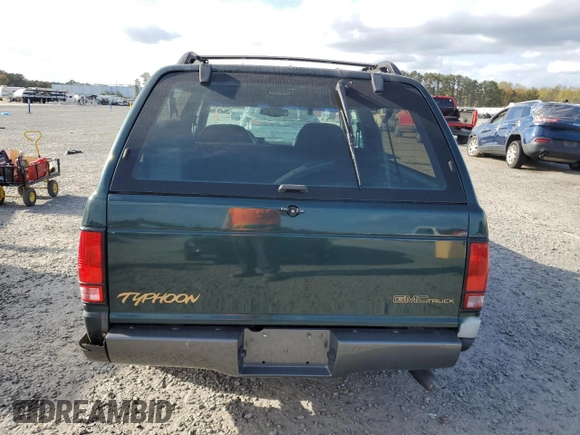 1993 GMC Jimmy z VIN 1GDCT18Z9P0810178, wystawiony jako Copart lot #79442614 z przebiegiem 19 514 mil mil oraz Szkoda całkowita • Salvage title. Historia ofert i sprzedaży dostępna na DreamBid. Obrazek 6.