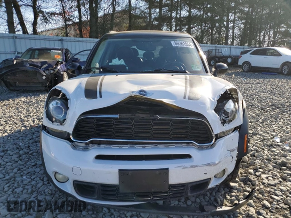 2012 MINI Countryman S with VIN WMWZC3C57CWM27732, listed as a Copart auction lot 80361854 with 120,735 mi miles and Salvage title. Bid and sale history available at DreamBid. Image 5.