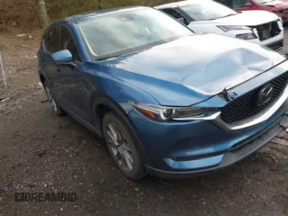 2020 Mazda CX-5 Grand Touring with VIN JM3KFADM4L0827733, listed as a IAAI auction lot 41482517 with 43,597 mi miles. Bid and sale history available at carsss.com. Image 1.