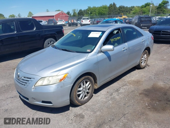 2007 Toyota Camry CE with VIN JTNBE46K173119853, listed as a IAAI auction lot 42133844 with 243,587 mi miles and . Bid and sale history available at DreamBid. Image 2.