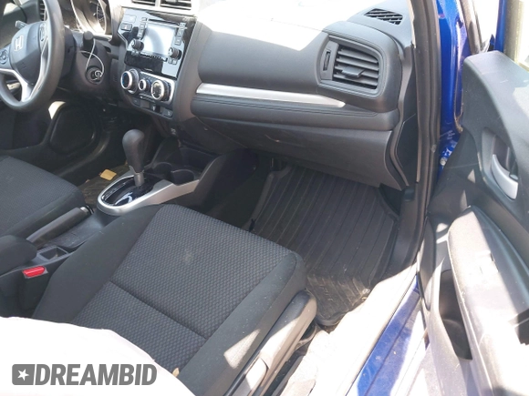 2019 Honda Fit LX with VIN 3HGGK5H48KM749935, listed as a IAAI auction lot 42082491 with 19,077 mi miles. Bid and sale history available at carsss.com. Image 5.