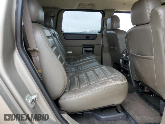 2003 Hummer H2 with VIN 5GRGN23U73H102412, listed as a Copart auction lot 87419024 with 176,456 mi miles and Salvage Title. Bid and sale history available at carsss.com. Image 10.