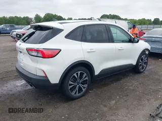 2021 Ford Escape SE z VIN 1FMCU0G6XMUB32625, wystawiony jako IAAI lot #42279918 z przebiegiem 93 646 mil mil oraz . Historia ofert i sprzedaży dostępna na DreamBid. Obrazek 4.