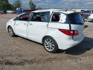 2013 Mazda 5 Touring with VIN JM1CW2CLXD0151396, listed as a IAAI auction lot 40479013 with 118,314 mi miles and . Bid and sale history available at DreamBid. Image 3.