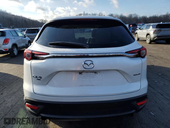 2020 Mazda CX-9 Touring z VIN JM3TCBCY0L0406437, wystawiony jako Copart lot #46789725 z przebiegiem 56 279 mil mil oraz Szkody całkowita. Historia ofert i sprzedaży dostępna na DreamBid. Obrazek 6.